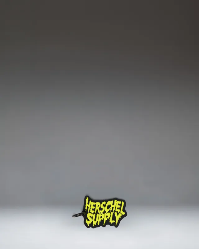 herschel-supply-co-slime-bag-charm-porte-cl-s-en-silicone-vert-d-goulinant image 1