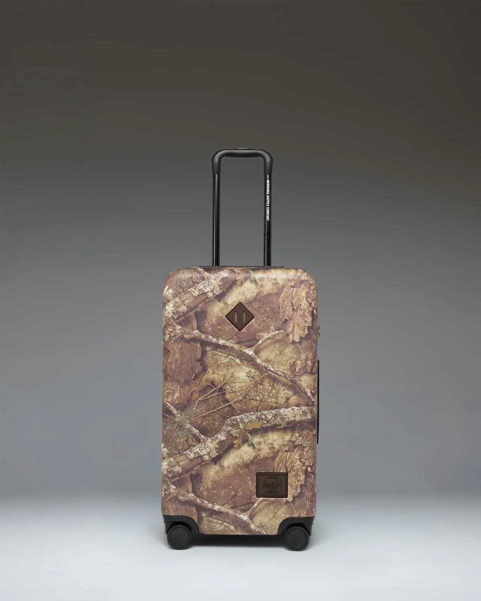 valise-rigide-herschel-heritage-medium-66-l-realtree-apx-soute-70-polycarbonate- image 1