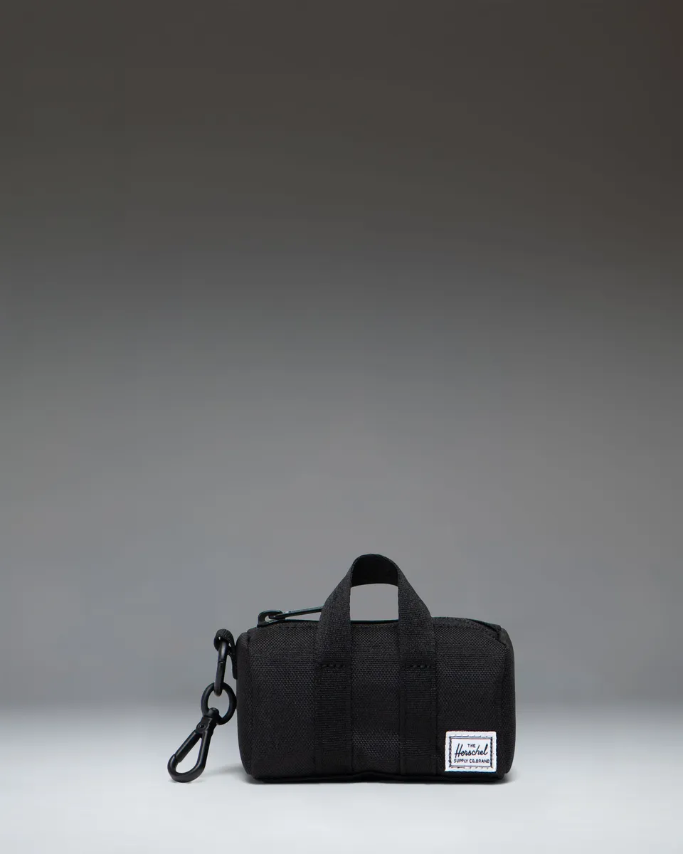 herschel-supply-co-novel-duffle-bag-charm-porte-cl-s-mini-sac image 1