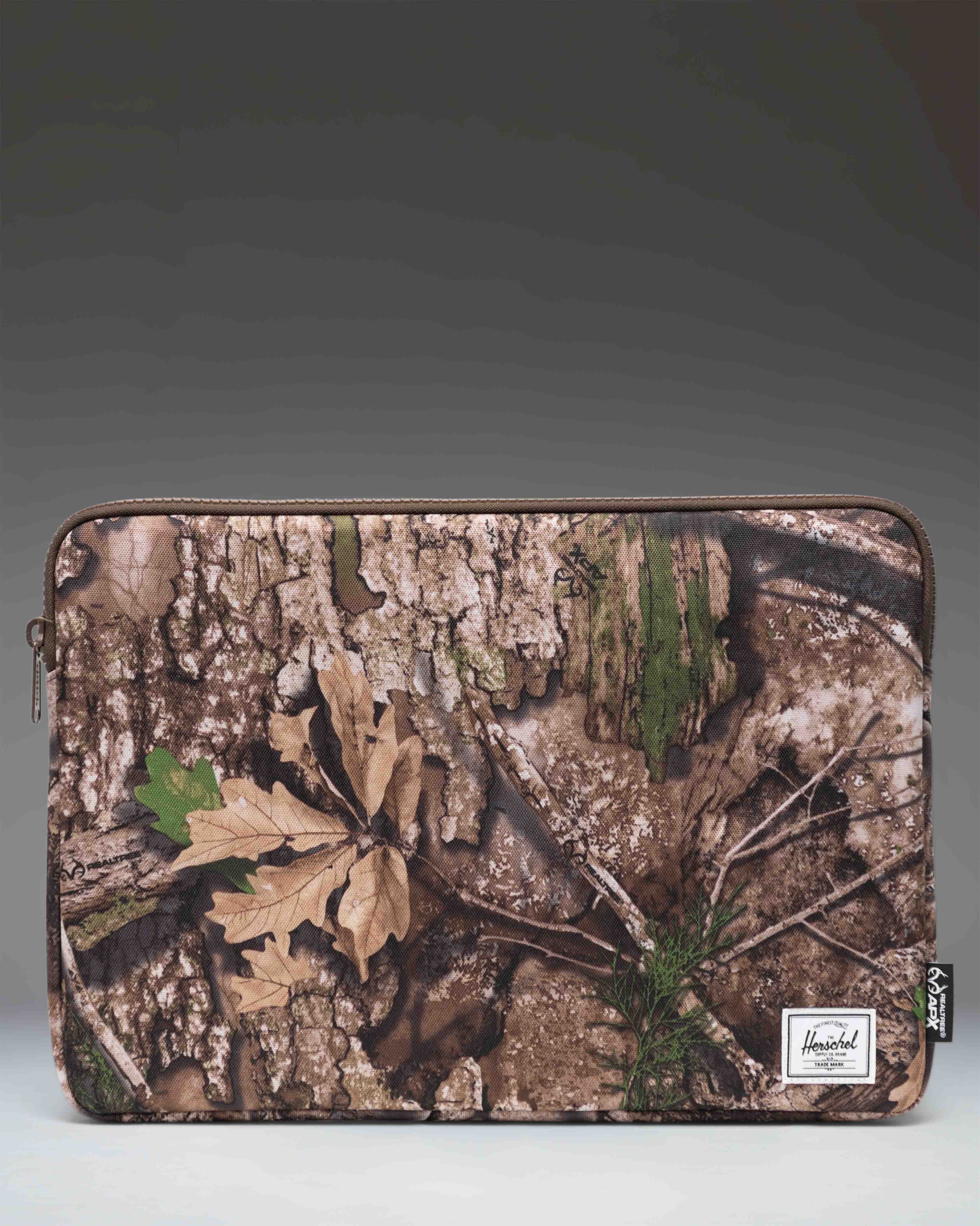 herschel-x-realtree-anchor-15-16-inch-sleeve-housse-ordinateur-camouflage image 1