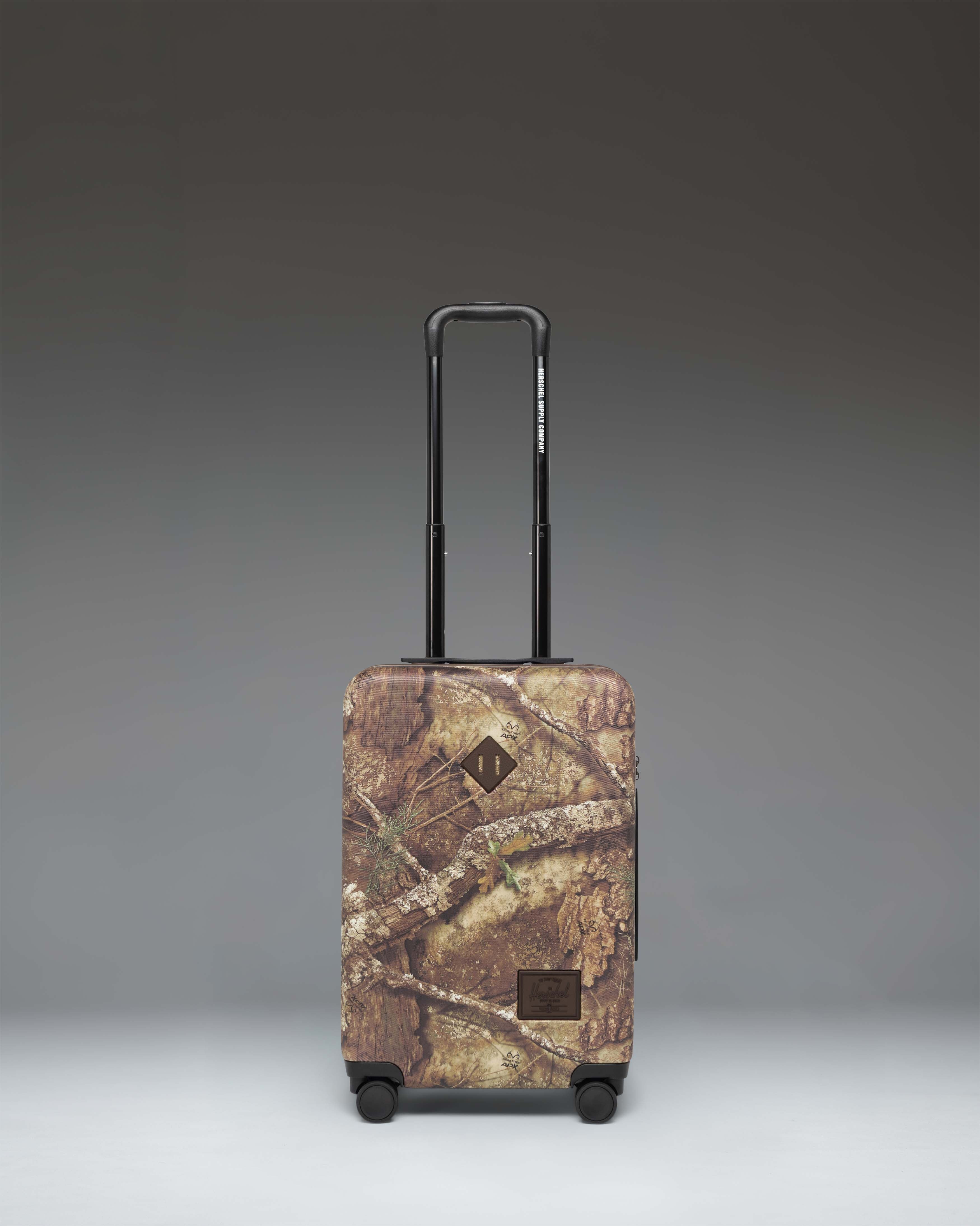herschel-heritage-large-co-valise-cabine-avec-motif-realtree-apx image 1